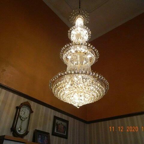 cuci lampu kristal andal di prima harapan regency 47